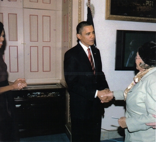 Gertrude shaking hands with the President
